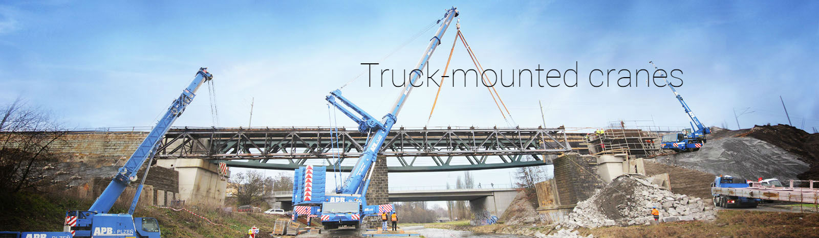 Truck-mounted cranes